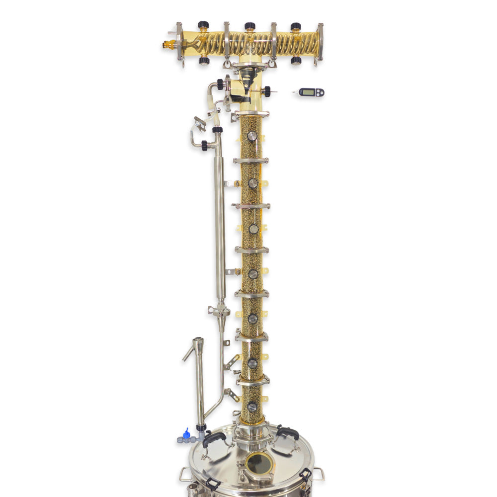 A PolyPhoenix modular distillation still made of PPSU with various attachments such as condensers and connectors, primarily in clear and metallic colors.