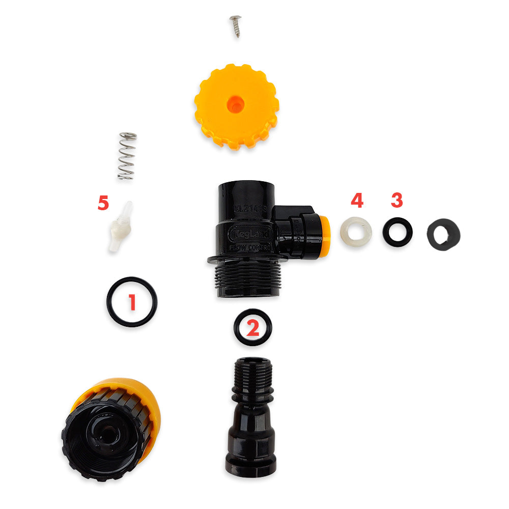 Set of plumbing parts including a black T-valve, washers, and springs on a white background.
