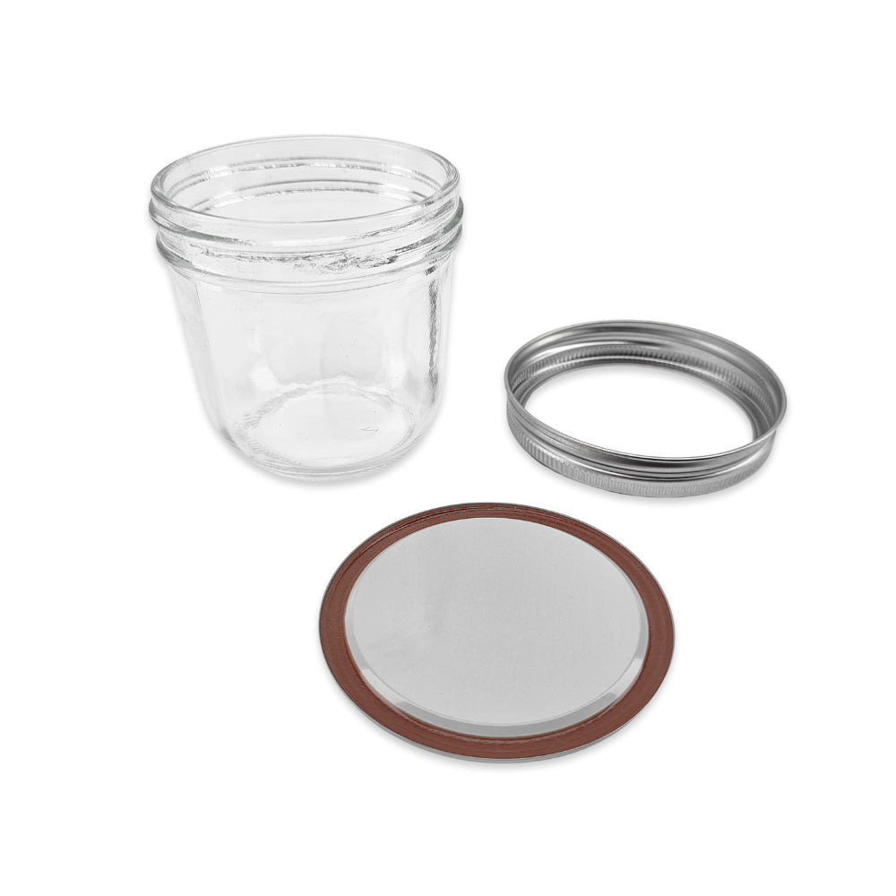 Haul Mason Jars use a two part lid sealing mechanism. The Flat Seal and the Threaded Lid Ring.