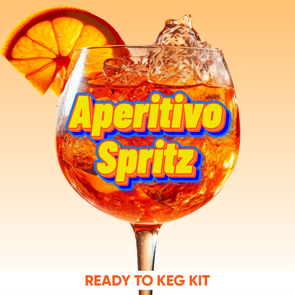 Goblet of Aperitivo Spritz with ice and orange slice on a peach background