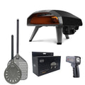 Ooni Koda 2 14" Pizza Oven with accessories including pizza peel, spinner peel, infrared thermometer and waterproof carry cover.