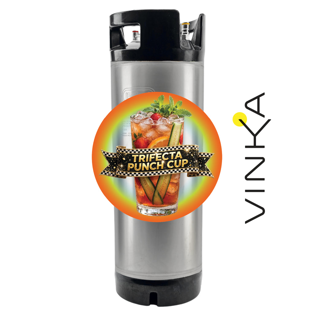 A stainless steel keg with a black top and bottom cap, featuring a circular graphic overlay of a 'Trifecta Punch Cup' cocktail and the brand name 'VINKA' printed vertically on the right side.