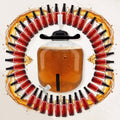 A FermZilla Flat Bottom with Beer Fermenting inside it. Surrounding by PET Amber bottles.