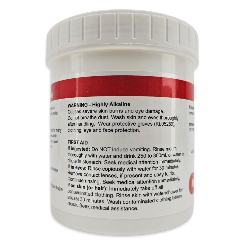 Warning label. Highly alkaline. First Aid instructions.