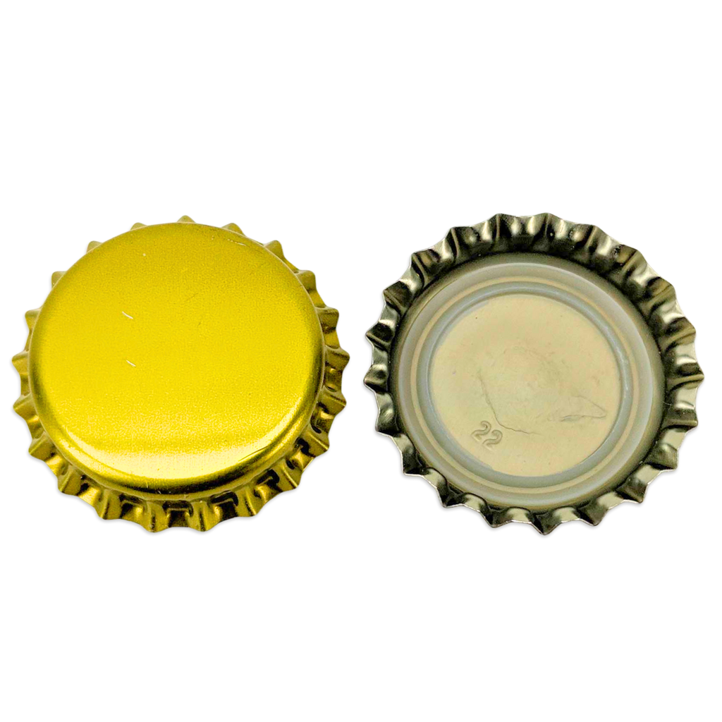 Two bottle caps, one yellow and one metallic, on a white background