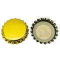 Two bottle caps, one yellow and one metallic, on a white background