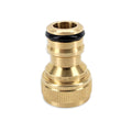 Brass hose fitting on a white background