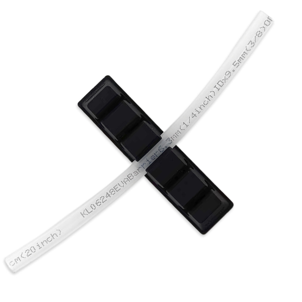 Black silicone mold with measurement markings on a white background