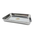 Stainless steel drip tray on a white background