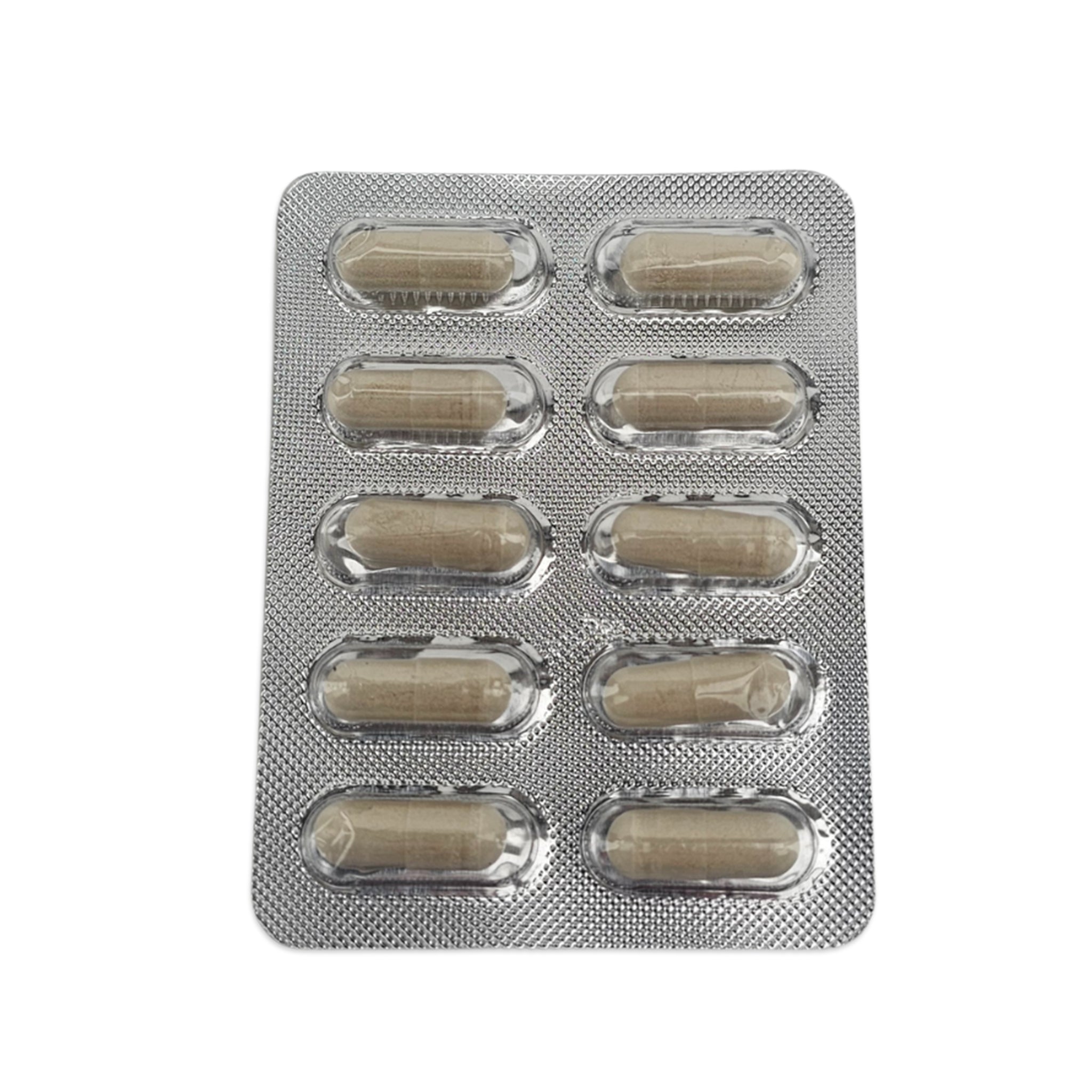 Silver blister pack with beige capsules on a white background