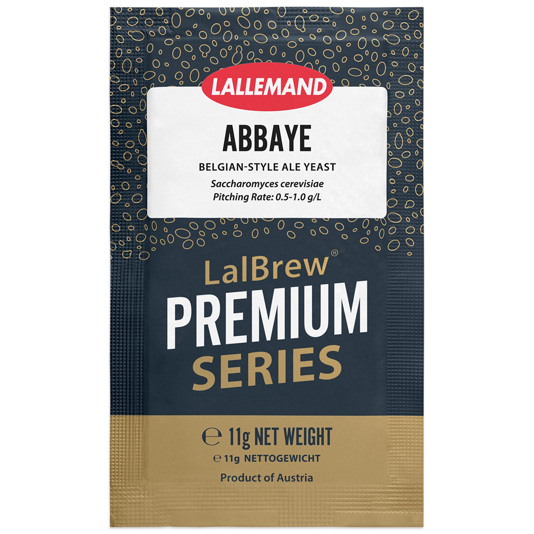 A single packet of LalEmand Abbaye Belgian-Style Ale Yeast from the LalBrew Premium Series. The packaging features a dark navy blue textured background with gold abstract patterns, a white label with red and black text, and a gold-colored bottom section.