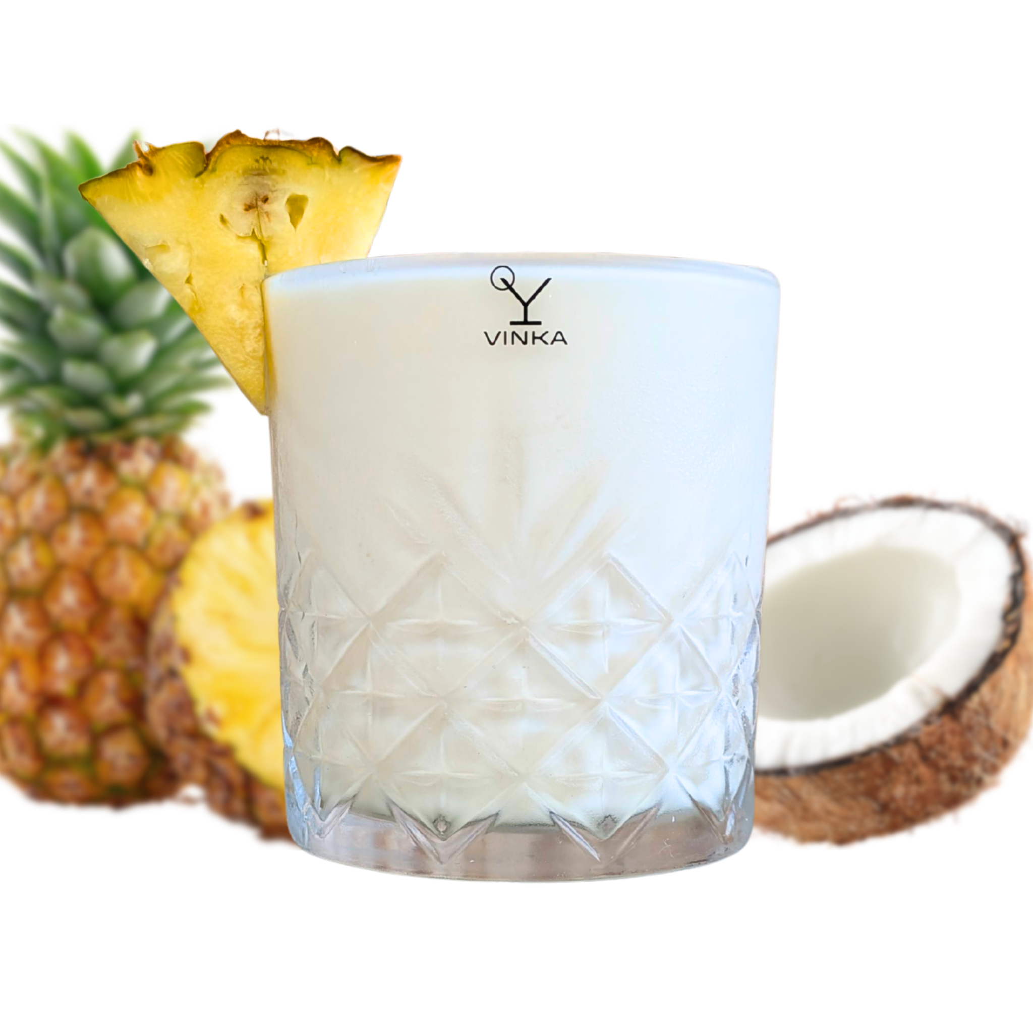The Easiest Pina Colada Recipe. In VINKA Glass with Pineapple and Coconut in background